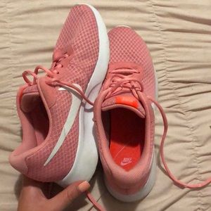 Pink Nike Tanjun running shoe